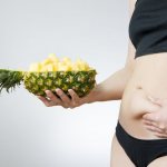 girl eats pineapple to lose weight