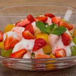 Fruit salad with peaches and grapes