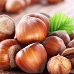 How many calories are in hazelnuts (in 100 g and in 1 piece)